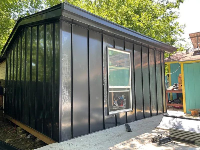 Black standing seam metal wall panels for Roof Inspection in Fremont